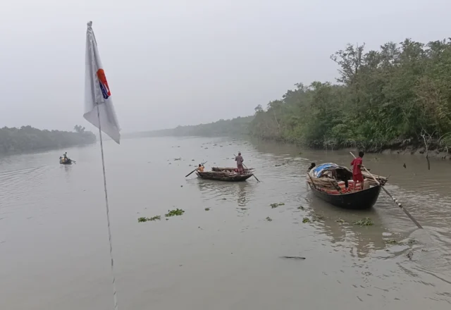 A couple of boats heading out to fish in the Sundarbans