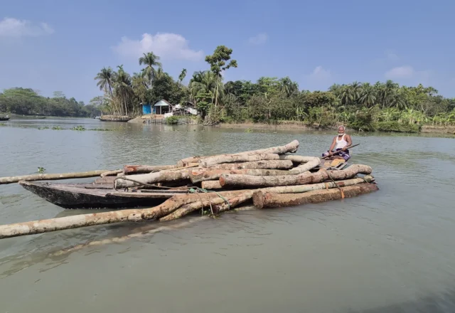 A farmer going to Timber Market through riverway