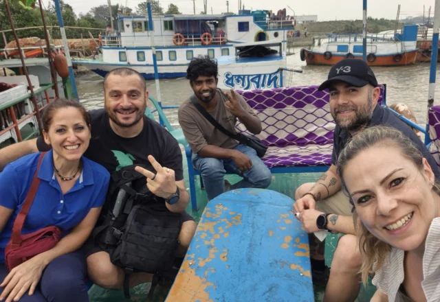 A group of tourists in boat station Sundarbans
