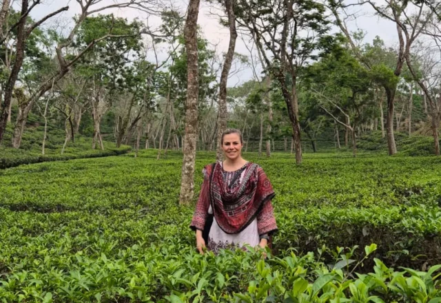 A tourist wearing traditional Bengali dress in tea garden