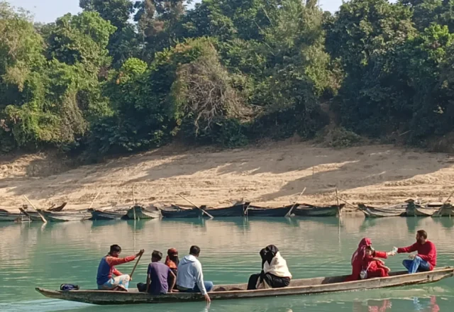 Crossing Lala Khal on boat