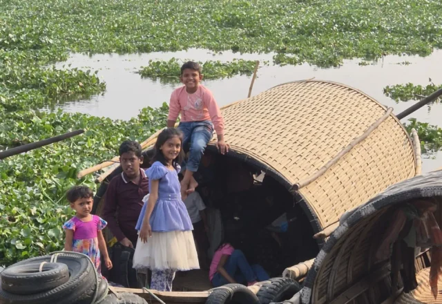Local children on a boat in Mighty Meghna River