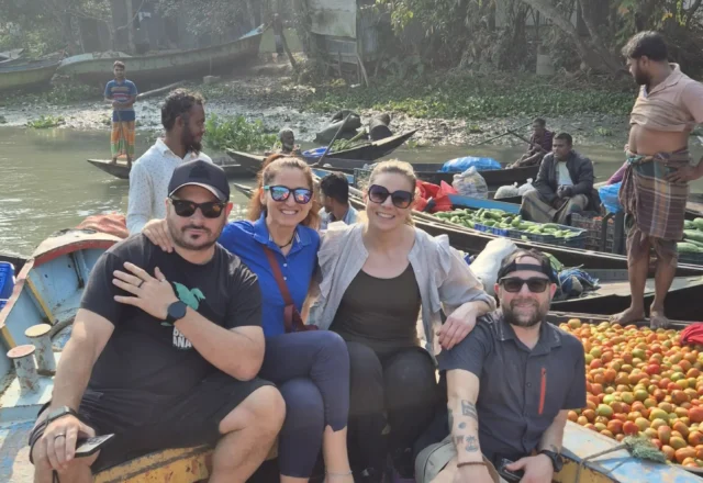 Tourists chilling out in the floating market in Barishal