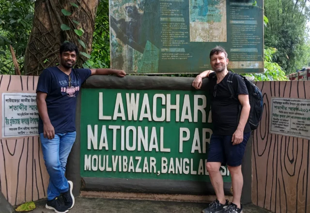 Abu raihan with a tourist at lawachara national forest gate