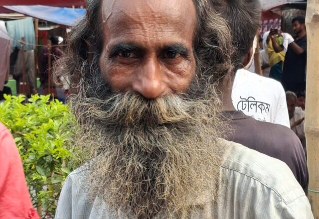 Portrait of a baul with a long grey beard at the Lalon Mela, Kushtia