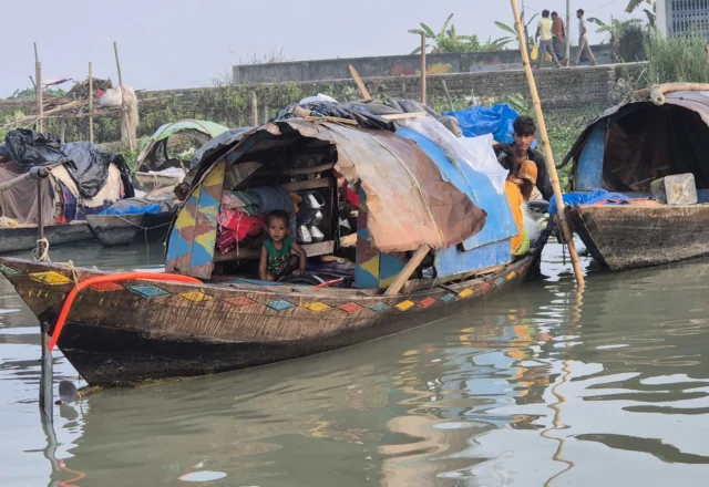 Gypsy people living on boat in the river
