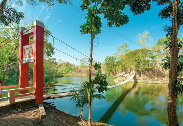 Hanging bridge over the lake at Meghla Tourism Complex, Bandarban